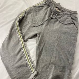 Grey joggers with cool neon details on the sides🧪